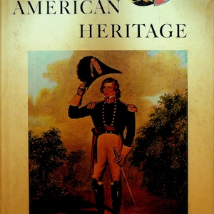 May include: A vintage magazine cover featuring a portrait of Brigham Young, Lieutenant General of the Nauvoo Legion, circa 1844. The cover is titled "American Heritage" and the date "February 1965" is printed at the bottom.