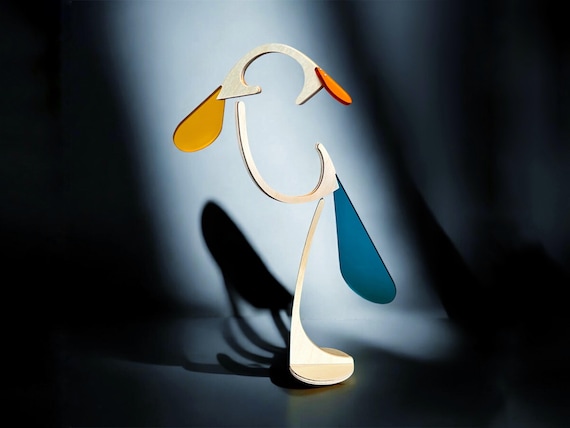 A Calder-inspired mid-century bird mobile with 198 favorites — handcrafted balance art that turns any desk or shelf into a tiny museum.