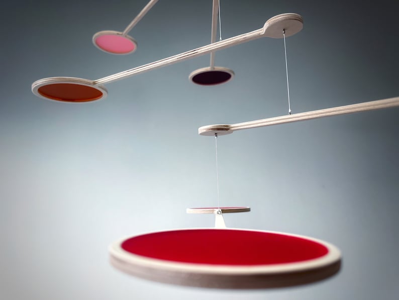 Red, pink, purple and orange mobile. Calder mobile, kinetic art and Baby mobile. Orbit Mobile, Hanging mobile and kinetic mobile. Abstract Art, Hanging Mobile and Kinetic Mobile. Modern Mobile. Mid Century Modern and Hanging Sculpture. The Illuminist