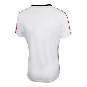 May include: White short-sleeved t-shirt with red and navy blue trim around the neck and sleeves.