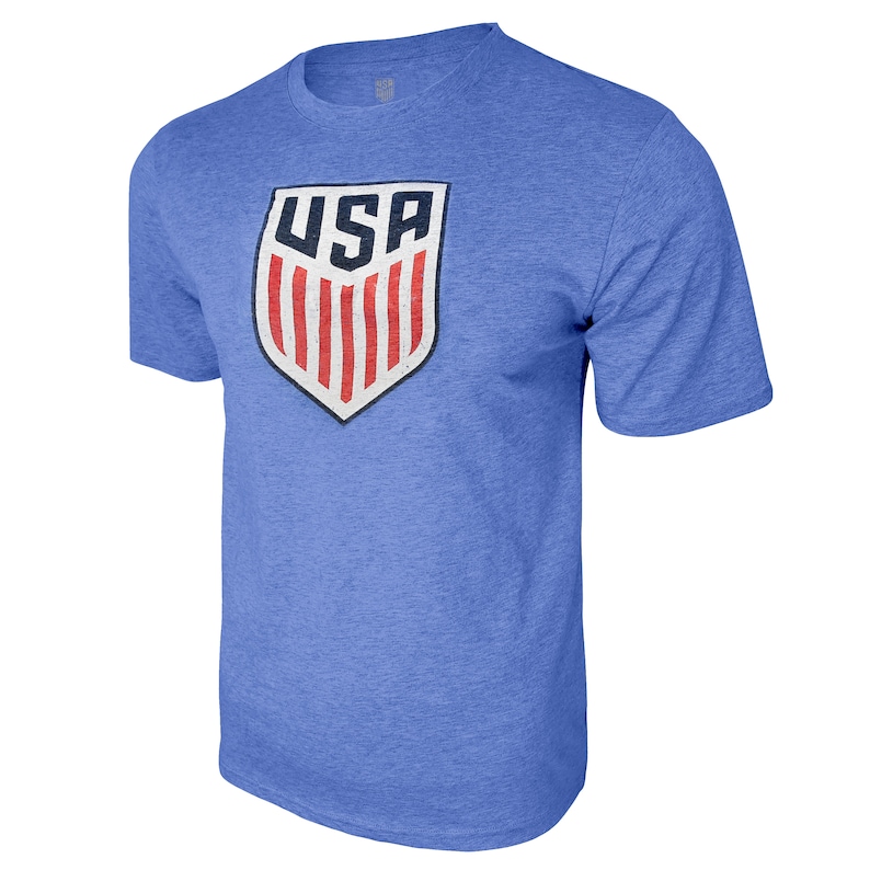 May include: A blue t-shirt with a vintage-style USA soccer logo in red, white, and blue.