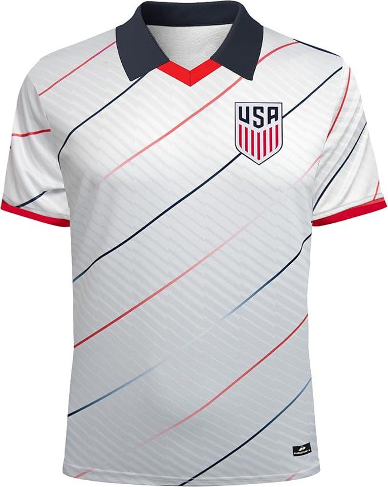 May include: White football shirt with red and blue diagonal stripes. The shirt features a navy blue collar and red sleeve trim. The USA emblem is on the chest.