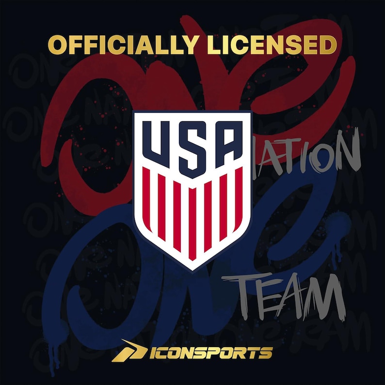 May include: A graphic with the text "OFFICIALLY LICENSED" in gold. The image features a shield with the letters "USA" and red and white stripes. The words "ONE TEAM" and "NATION" are also visible.
