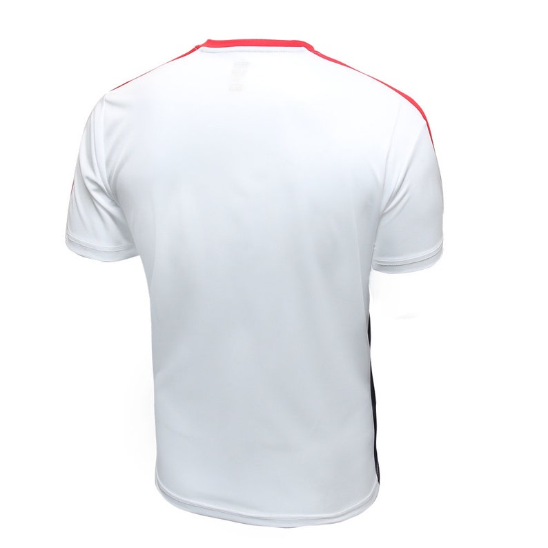 May include: White short-sleeved t-shirt with red and black trim around the neck and shoulders.