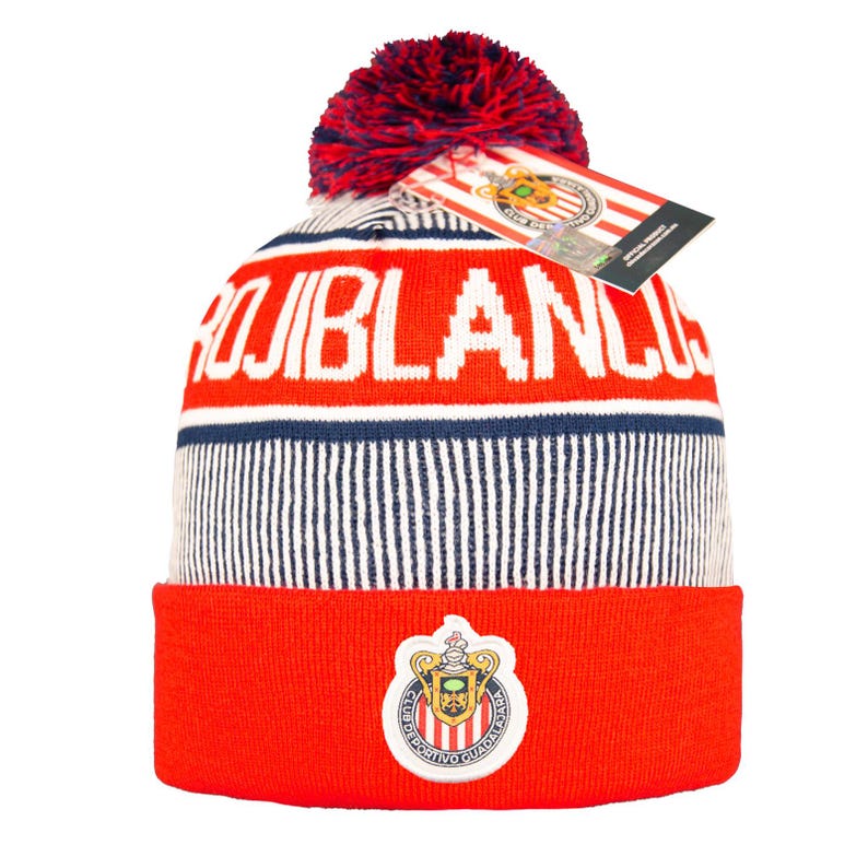 Puede incluir: Un gorro de punto rojo, blanco y azul con la palabra "ROJIBLANCOS" en letras blancas. El gorro presenta un logotipo del equipo en la parte delantera y un pomp&oacute;n rojo y azul en la parte superior. Una etiqueta est&aacute; adjunta.