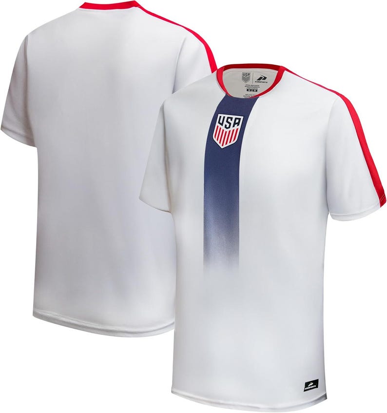 May include: White soccer jersey with a blue vertical stripe down the front and red accents on the shoulders and collar. The jersey features the USA emblem on the chest. The short-sleeved shirt is made of a lightweight material.