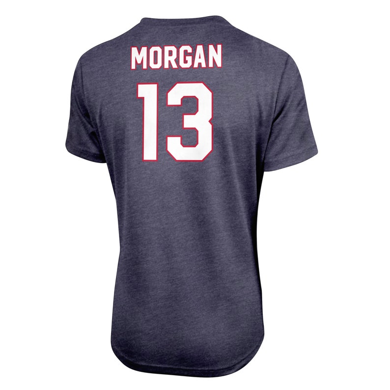 May include: A navy blue t-shirt with the name "MORGAN" and the number "13" printed on the back in white with red outlines.