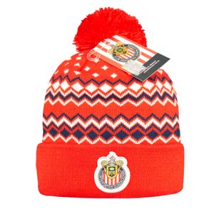 May include: Red knit beanie with a zig-zag pattern in white and navy blue. The beanie features a red pom-pom and a team logo patch on the front. A tag with the team name and logo is attached.