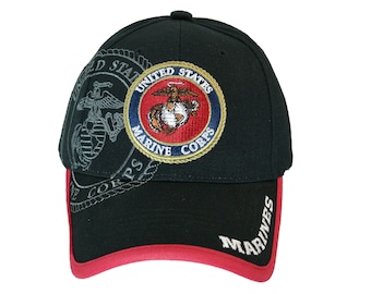 May include: Black baseball cap with a red brim. The front of the cap features an embroidered United States Marine Corps emblem with the words "United States Marine Corps". The back of the cap has the word "Marines" embroidered in white.