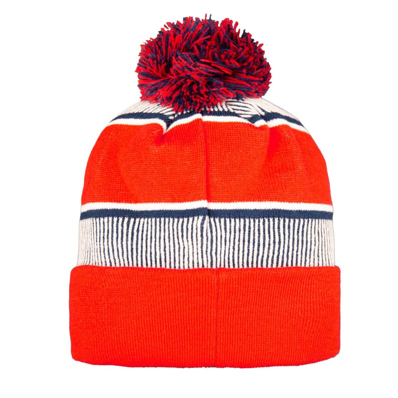 Puede incluir: Un gorro de punto naranja brillante con un pomp&oacute;n rojo, blanco y azul. El gorro presenta rayas horizontales blancas y azul marino, y un borde doblado. Un accesorio de invierno.