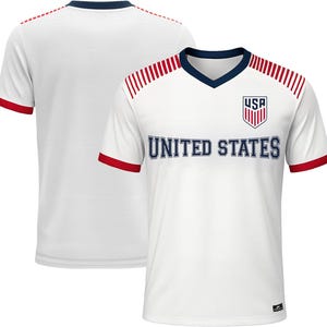 May include: White soccer jersey with red and navy blue accents. The jersey features a V-neck collar, red stripes on the shoulders, and the text "UNITED STATES" across the chest. The USA logo is on the upper chest.