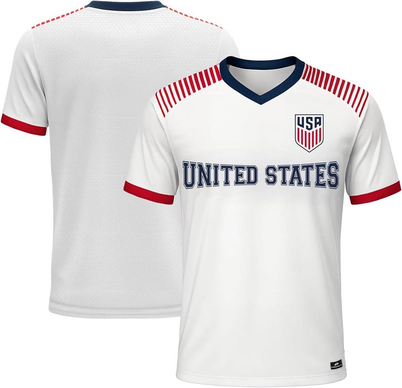 May include: White soccer jersey with red and navy blue accents. The jersey features a V-neck collar, red stripes on the shoulders, and the text "UNITED STATES" across the chest. The USA logo is on the upper chest.
