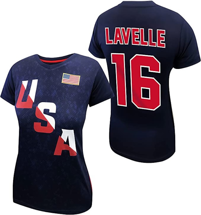 May include: A navy blue t-shirt with the word "USA" printed on the front in red, white, and blue. The back of the shirt has the name "LAVELLE" and the number "16" printed in red.