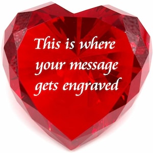 May include: A red crystal heart with the text "This is where your message gets engraved" on the front.