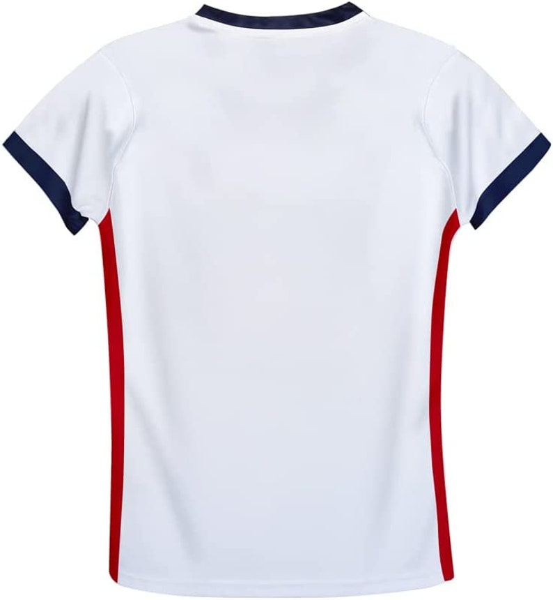 May include: White short-sleeved t-shirt with red and navy blue trim. The shirt has a crew neck and a plain front.