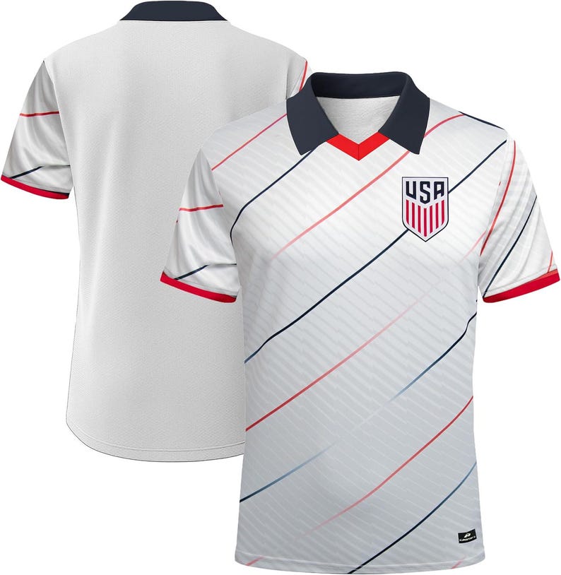 May include: White football shirt with diagonal red and blue stripes. The shirt has a navy blue collar with a red V-neck and red trim on the sleeves. The USA emblem is on the chest.