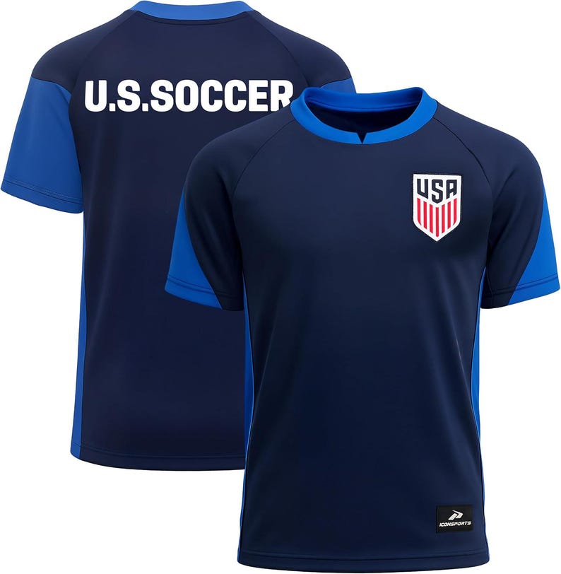May include: Navy blue soccer jersey with blue accents on the sleeves and collar. The front features a USA crest, and the back displays "U.S. SOCCER" in white block letters. The jersey is made of a lightweight, breathable material.