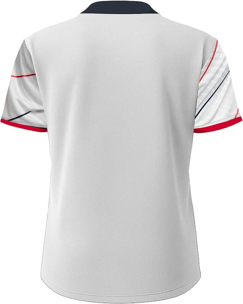 May include: White athletic shirt with a navy blue collar and red trim on the sleeves. The sleeves feature a white background with red and navy blue diagonal stripes. The shirt is made of a breathable, textured fabric.