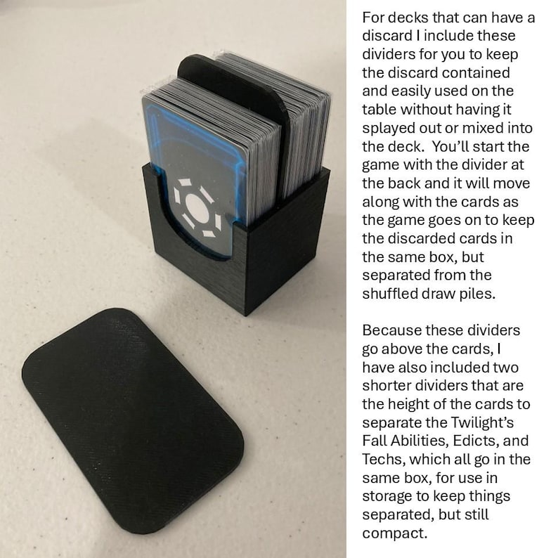 May include: Black card holder with a stack of cards, and a separate black card holder lid. The cards have a blue and white design. Text on the side explains the use of the card holder for game play.
