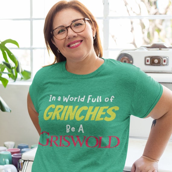 In a world full of grinches shirt Clearance