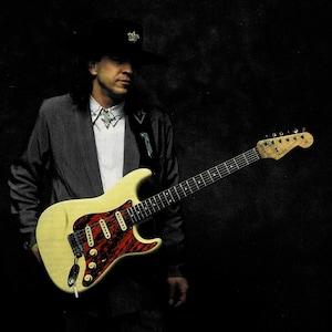 Stevie Ray Vaughan with his Fender Guitar - SRV - 1991 Music Print Ad Photo