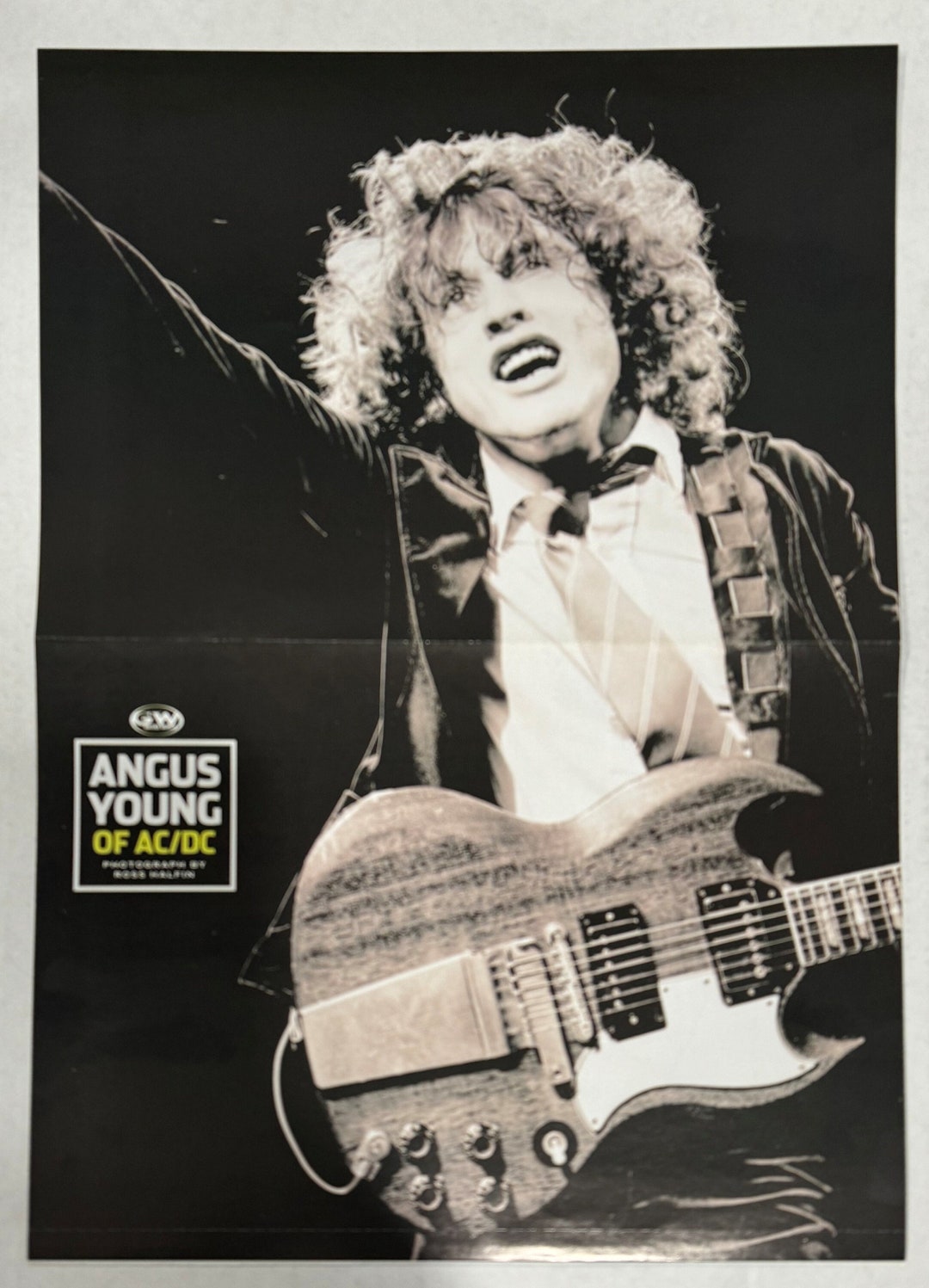 Angus Young de AC/DC / Malcolm Young - Póster de revista de doble cara ...