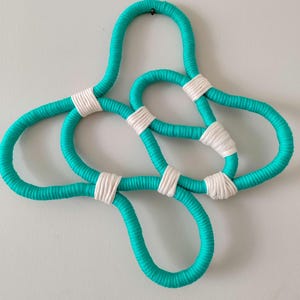 Handmade Asymmetric Turquoise & White Macrame Wall Hanging – Boho Home Decor, Celtic Knot Rope Art, Geometric Macrame Fiber Decor