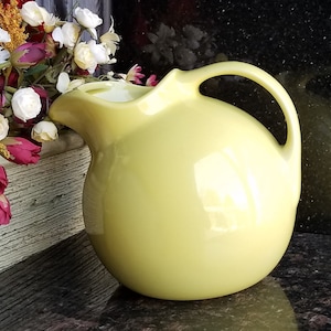 Hall Pottery Mustard Yellow Cannonball Tilting Pitcher - 8"