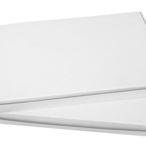 May include: Two white cardboard boxes stacked on top of each other. The boxes are empty and have a plain white surface.