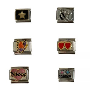 May include: Six silver charm bracelets with different designs. The charms include a star, a bee, a butterfly, two red hearts, a pink heart with the word "Niece" and two blue hearts with the word "children".