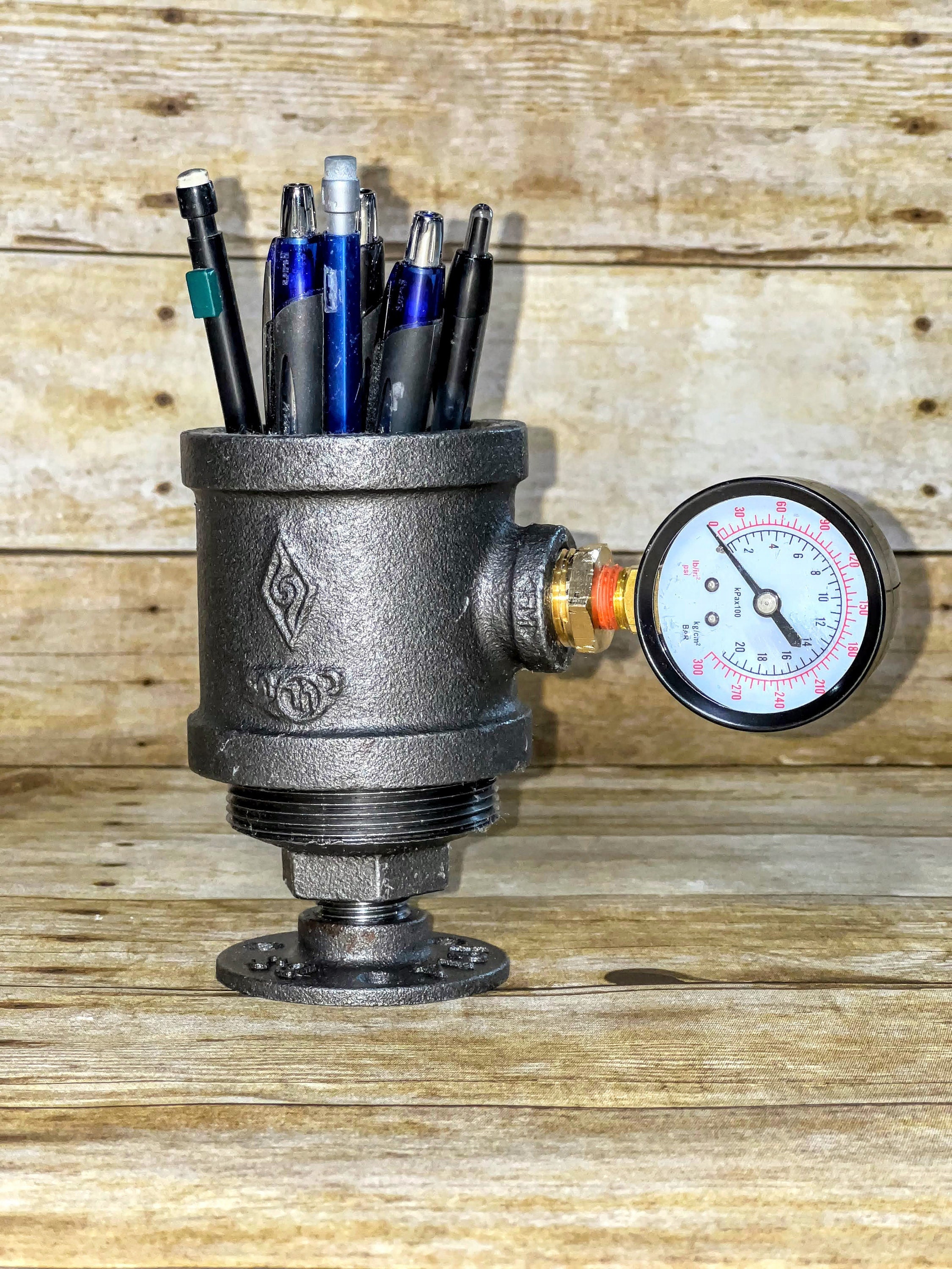 Industrial pipe pen holder with gauge/desk accessories