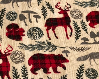 Must have cozy, warm cabin blanket with plaid, deer, bears and more