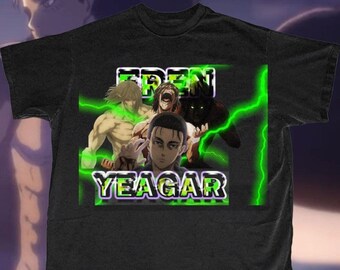 May include: Black t-shirt featuring a green and purple graphic of a character from the anime Attack on Titan. The graphic includes the text "EREN YEAGAR".