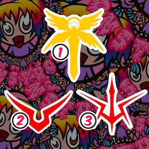 May include: Three iron-on patches with different designs. The first patch is yellow with a crown and wings. The second patch is red and shaped like a V. The third patch is red and shaped like a star.