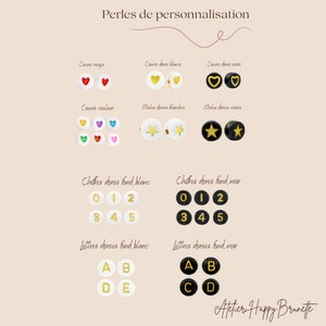 Puede incluir: Surtido de cuentas para personalizar, incluyendo corazones rojos, blancos y negros, estrellas doradas, n&uacute;meros dorados del 0 al 5 y letras doradas A, B, D y E. Algunas cuentas tienen un fondo blanco y otras un fondo negro.