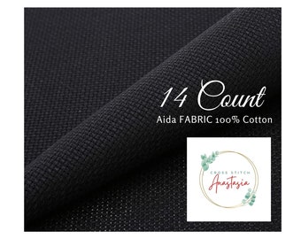 May include: Close-up of a folded piece of black 14-count Aida fabric, 100% cotton. The fabric has a woven texture. The text "14 Count" is displayed in a cursive font. The logo for "Cross Stitch Anastasia" is in the bottom right corner.