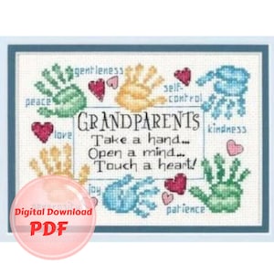 May include: A cross-stitch pattern featuring colorful handprints with words like "peace", "love", "gentleness", "self-control", "kindness", "joy", and "patience". The text "GRANDPARENTS Take a hand... Open a mind... Touch a heart!" is centered in the design.