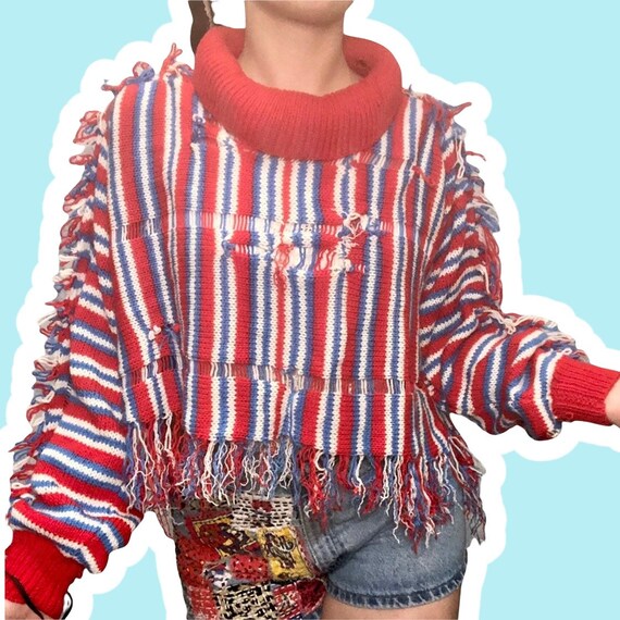 Distressed turtleneck shop sweater