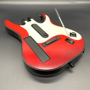 Placa ciega/cubierta para el mando de Wii de Guitar Hero