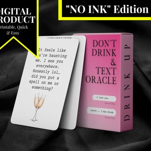May include: A pink and white card deck with the title "Don't Drink & Text Oracle" and the text "Drink Up" on the side. The cards have text such as "It feels like you're haunting me. I see you everywhere. Honestly lol... did you put a spell on me or something?" and "I love you. Delivered 11:11pm" and "sorry... I was drunk. Delivered 11:11pm".