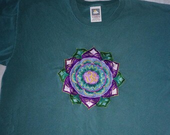 Short Sleeve green t shirt embroidered in Nepal 1998with a  Lotus Flower and Om sign Original Owner pre worn vintage