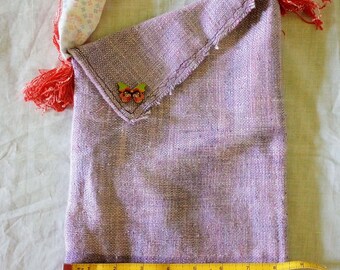 Hand bag of hand dyed and woven with top handle butterfly snap button closure one of a kind  8.5 inches by 14 inches