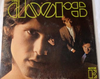 Vintage The Doors Album Same title Vinyl in very good condition cover shows wear original owner Electra Record Co 1967 EKS-74007-B