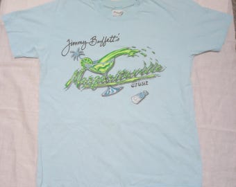 Vintage Jimmy Buffett aqua short sleeve large t shirt pre owned and shows wear original owner purchased from his store in Key West 1987