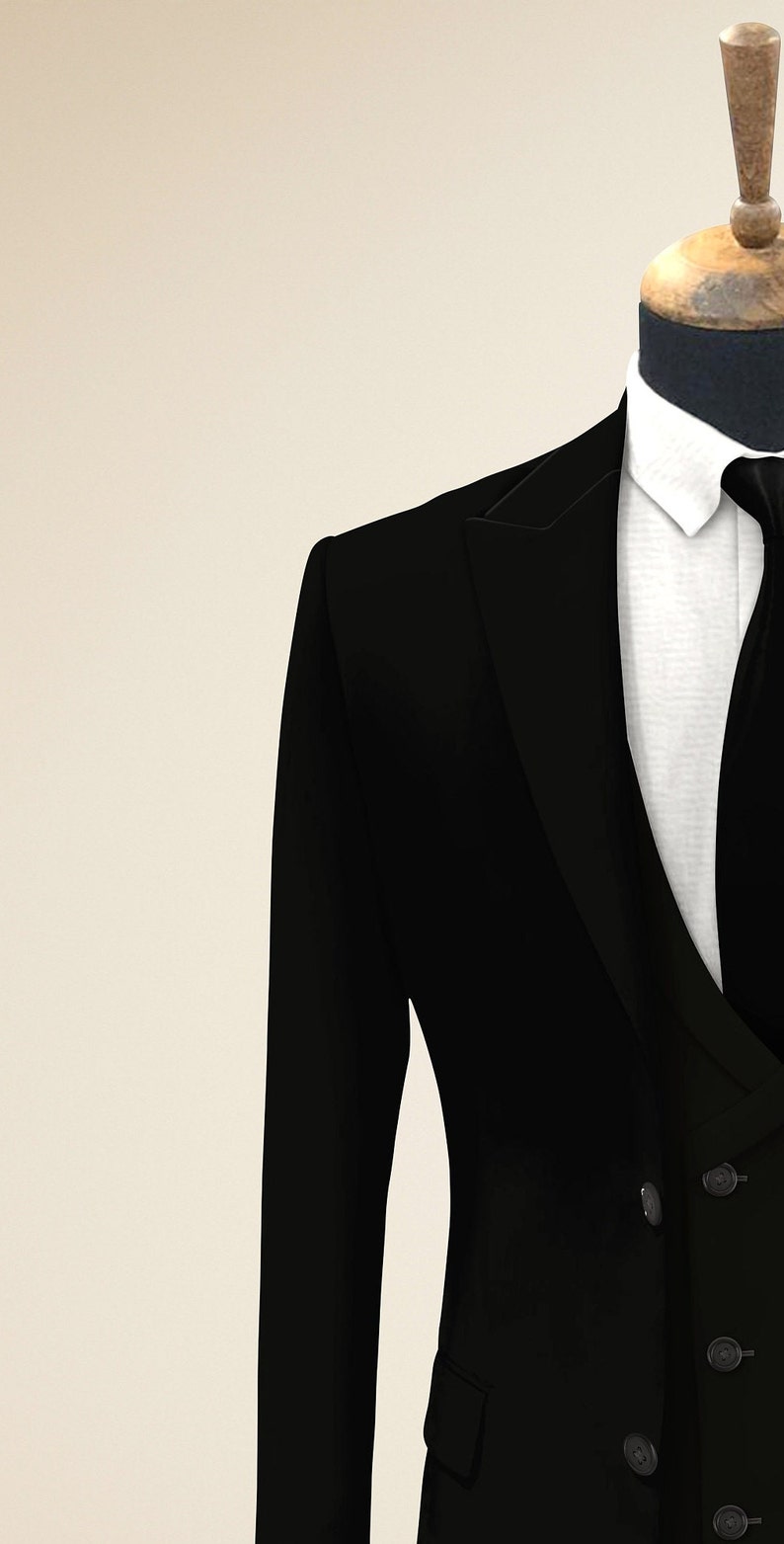 May include: A black double-breasted suit jacket with a white dress shirt and a black tie.