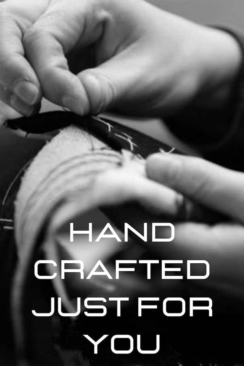 May include: A close-up of a hand carefully sewing fabric. The text "HAND CRAFTED JUST FOR YOU" is displayed below the image.