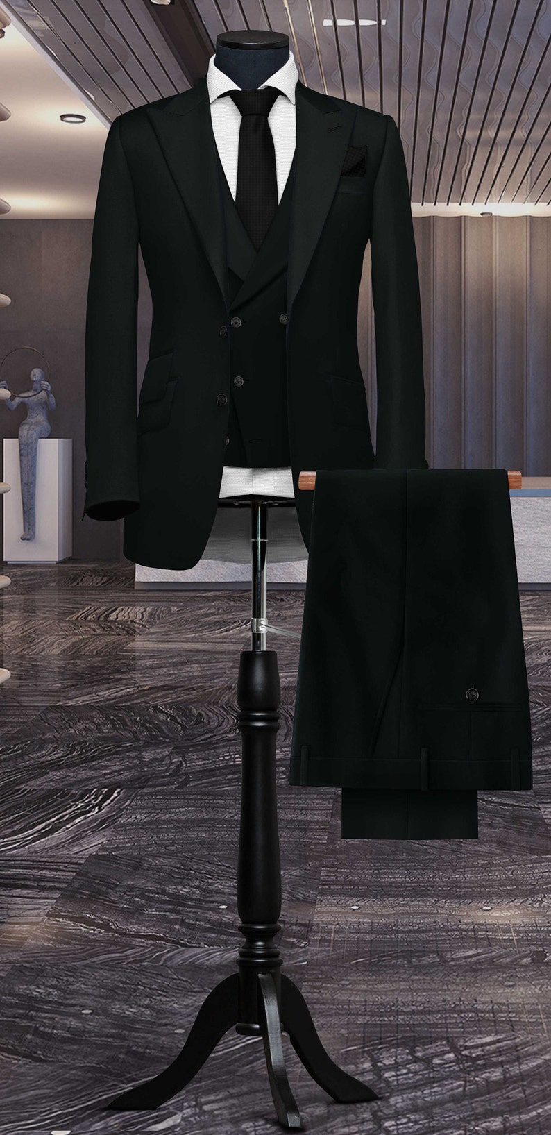 May include: A black three-piece suit with a double-breasted jacket, a vest, and matching pants.