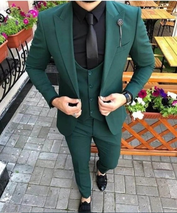 Teal green store suit for groom
