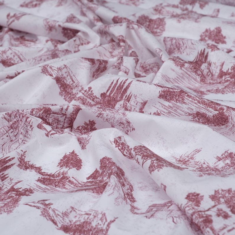 May include: White fabric with a repeating pattern of a red-brown ink drawing of a landscape with trees and buildings.
