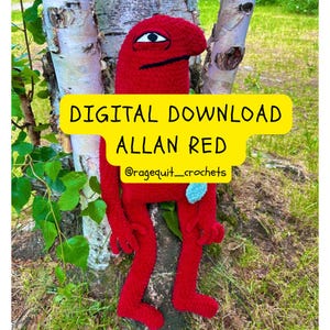 Op de afbeelding: Een rode gehaakte pop genaamd Allan Red, met een groot hoofd, één oog en lange ledematen. De pop staat tegen een boomstam, met een lichtblauw accent en een gele banner met de tekst "DIGITAL DOWNLOAD ALLAN RED @ragequit_crochets."